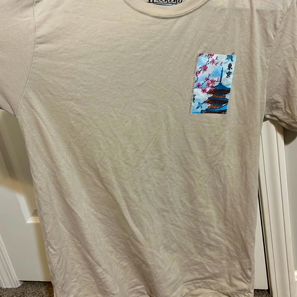 tan shirt with design